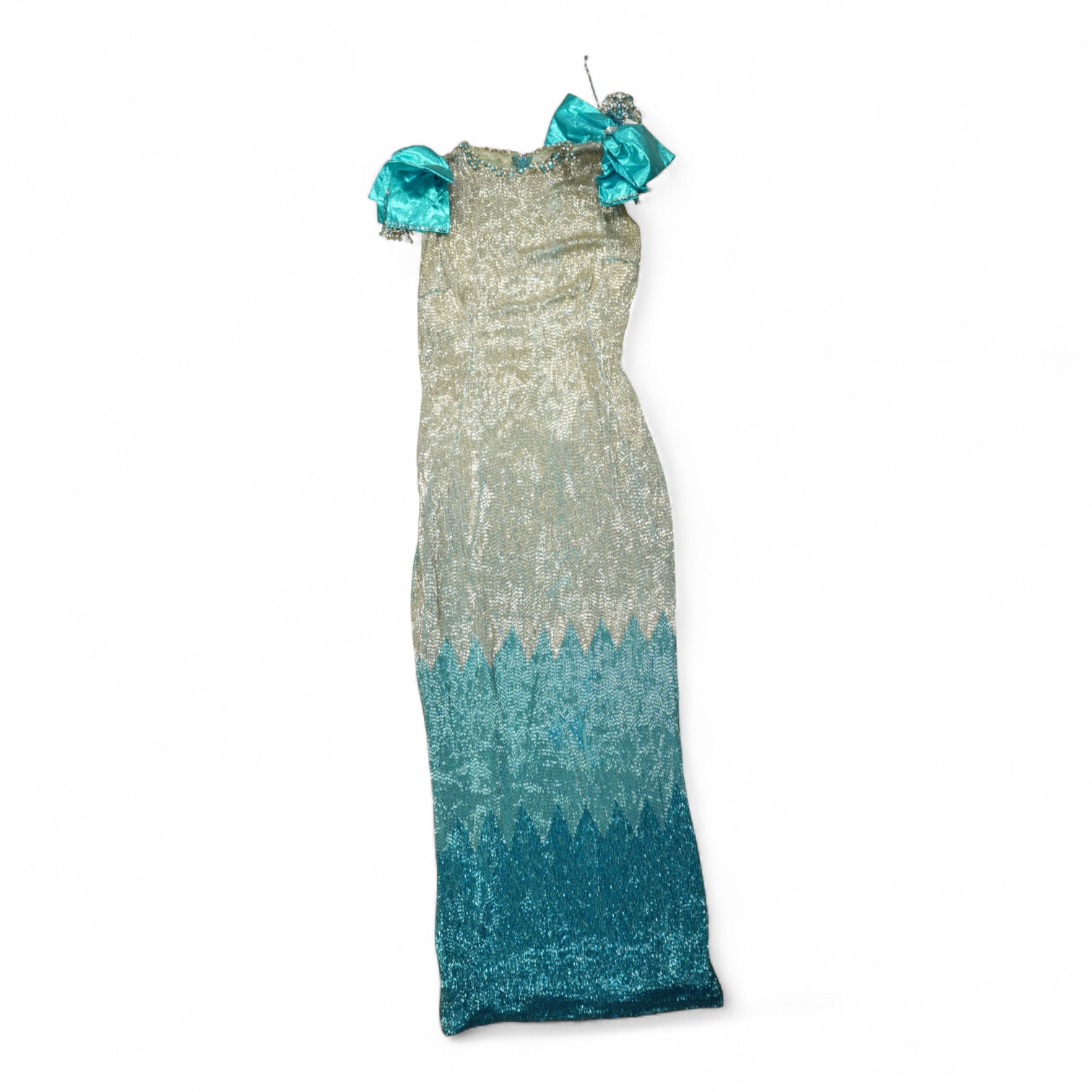 A graduated beaded turquoise and silver bugle beaded evening dress, with large turquoise metalic bows at the shoulders with diamonte, pearl and bead tassel decoration, bust front 39cm, length 127cm